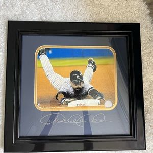 Derek Jeter NY Yankees signed 7.5x 10 photo. Framed 16.5 x 17.5. Sliding to base